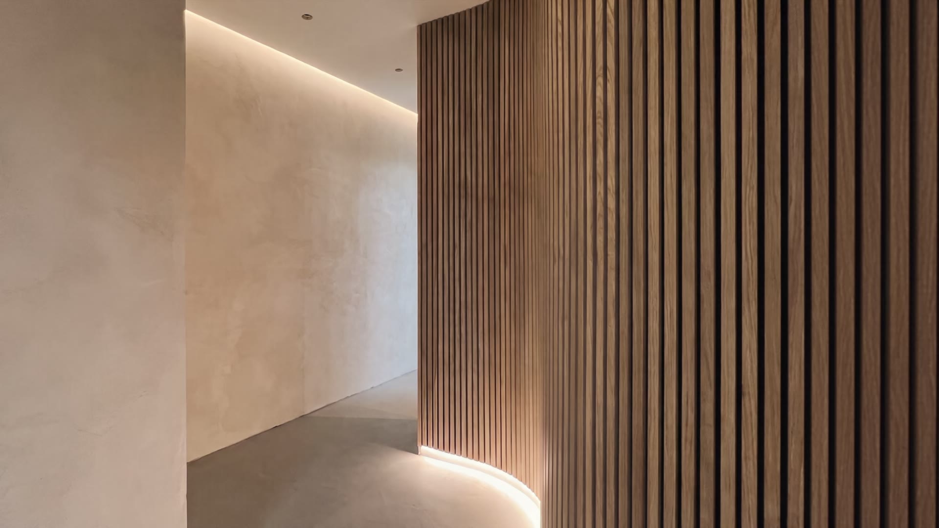 Exposed suspended ceiling grid mid-installation in a Singapore commercial fit-out